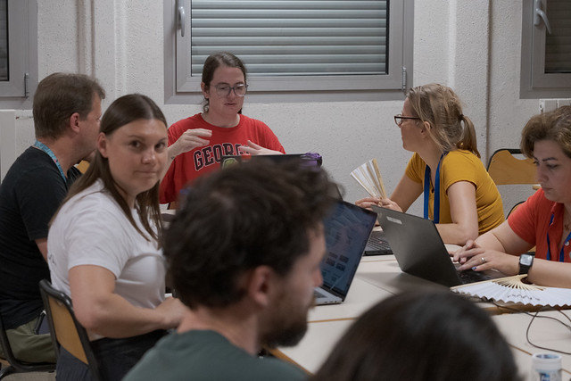 GCC2026 CoFest participants working together at a table.
