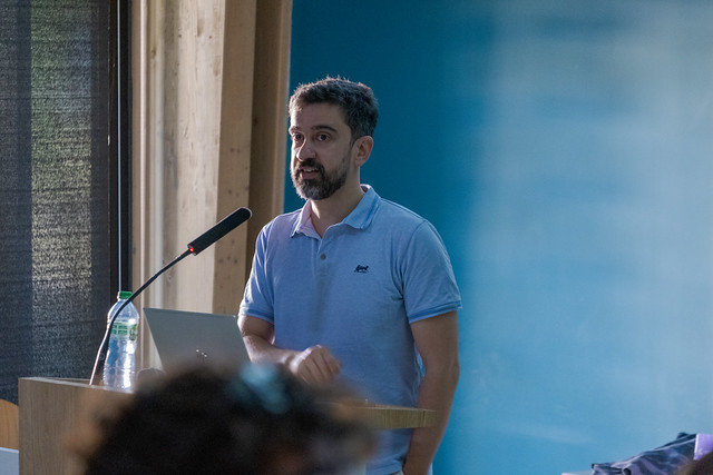 Rayan Chikhi presenting the GCC2026 keynote.