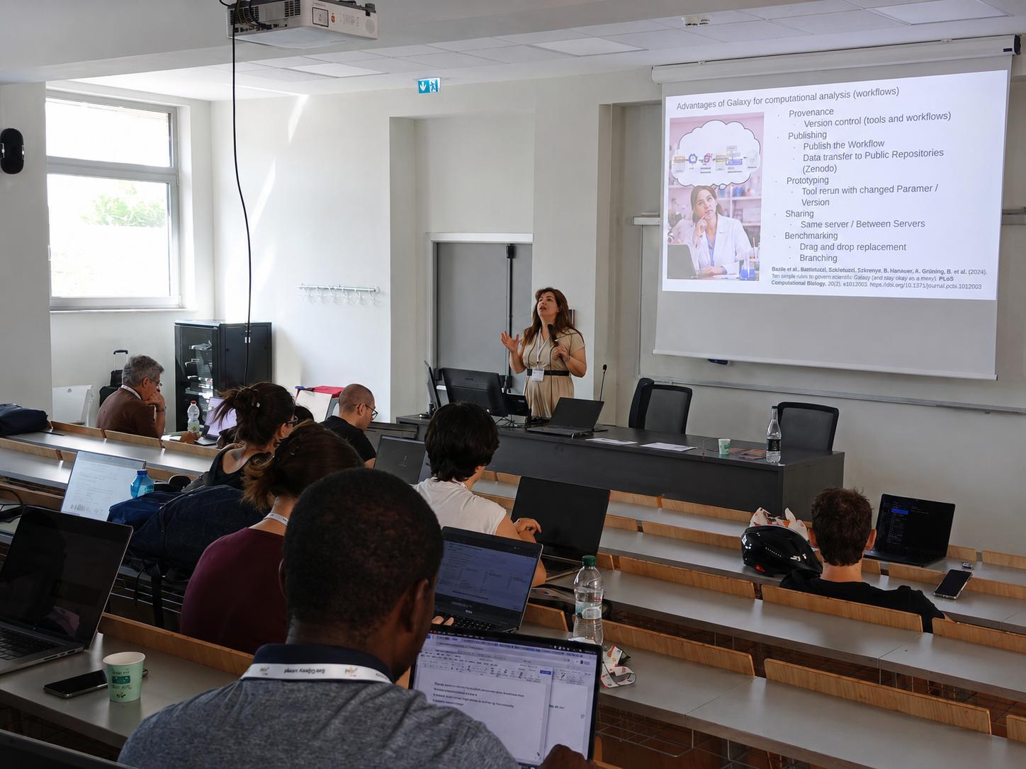 Mina Hojat Ansari delivering Galaxy training during the microbiome summer school in Bari